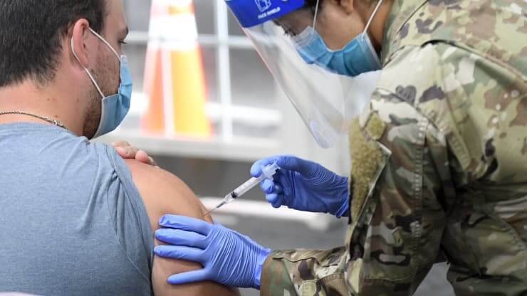 U.S. will deploy troops to help hospitals during omicron wave, distribute free Covid tests starting in January