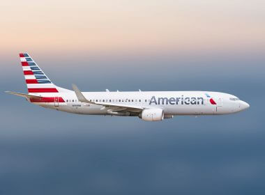 American Airlines passenger enters cockpit, damages controls