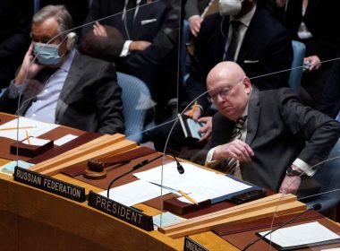 Russia's ambassador to the U.N., Vasily Nebenzya, sits next to U.N. Secretary-General Antonio Guterres on Feb. 23 while the Security Council debates a resolution to condemn Russia for its threats to Ukraine. Photo: Timothy A. Clary/AFP via Getty Images