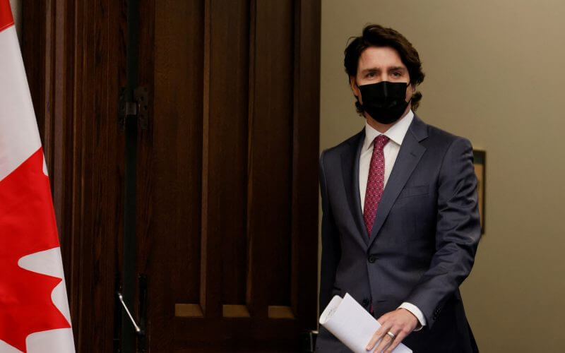 Canada Prime Minister Justin Trudeau arrives to a news conference on Parliament Hill in Ottawa, Ontario, Canada, Feb, 14, 2022.