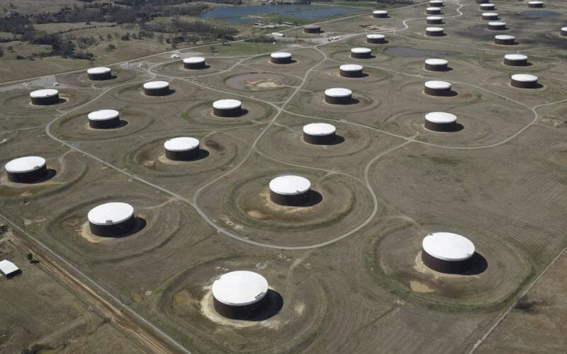 Crude oil storage tanks are seen from above at the Cushing oil hub, in Cushing, Oklahoma, March 24, 2016. REUTERS/Nick Oxford