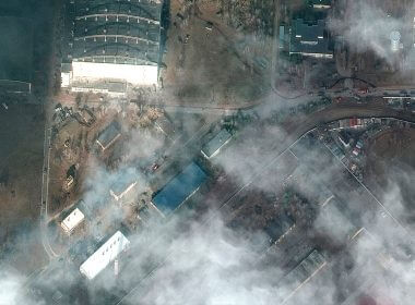 This satellite image provided by Maxar Technologies shows the aftermath of combat with grass fires and damage caused by recent airstrikes and heavy fighting with the Russians in and near the Antonov Airport, in Hostomel, Ukraine, Sunday, Feb. 27, 2022. (Satellite image ©2022 Maxar Technologies via AP)