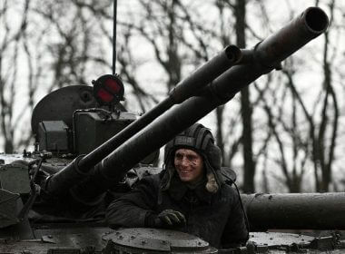 A Russian service member is seen on a BMP-3 infantry fighting vehicle during drills held by the armed forces of the Southern Military District at the Kadamovsky range in the Rostov region, Russia February 3, 2022. REUTERS/Sergey Pivovarov