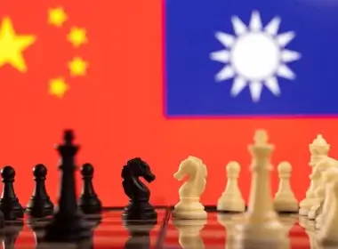 Chess pieces are seen in front of displayed China and Taiwan's flags in this illustration taken January 25, 2022. REUTERS/Dado Ruvic/Illustration