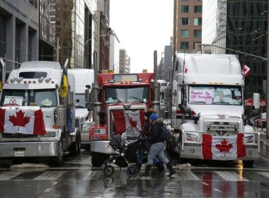 Trucks block a section of Metcalfe Street during a "Freedom Convoy" demonstration in downtown Ottawa, Ontario, Canada, on Thursday, Feb. 10, 2022. (David Kawai/Bloomberg via Getty Images)