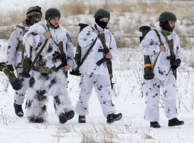 Ukrainian service members walk with M141 Bunker Defeat Munition weapons supplied by the United States during drills at the International Peacekeeping Security Centre near Yavoriv in the Lviv region, Ukraine, February 4, 2022. REUTERS/Roman Baluk/File Photo