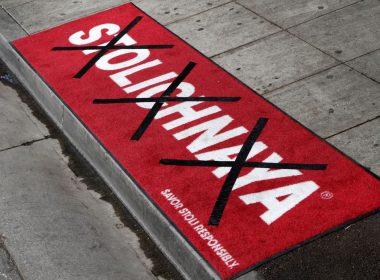 A piece of carpet with a logo of Stolichnaya, a brand of Russian vodka, is marked with black tape during a news conference at Micky's nightclub in West Hollywood, California August 1, 2013. REUTERS/Jonathan Alcorn