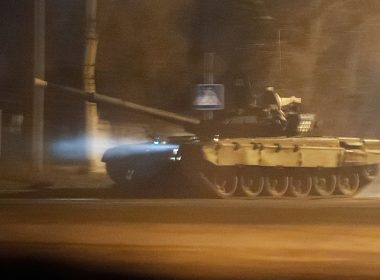 A tank travels along a street after Russian President Vladimir Putin ordered the deployment of Russian troops to two breakaway regions in eastern Ukraine following the recognition of their independence in the separatist-controlled city of Donetsk, Ukraine, Feb. 22, 2022. (REUTERS/Alexander Ermochenko)