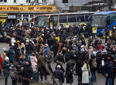 People wait for buses at a bus station as they attempt to evacuate the city Feb. 24, 2022, in Kyiv, Ukraine. Overnight, Russia began a large-scale attack on Ukraine, with explosions reported in multiple cities and far outside the restive eastern regions held by Russian-backed rebels. (Pierre Crom/Getty Images)