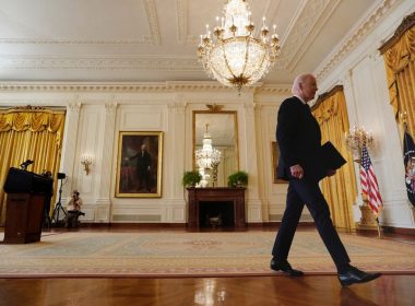 U.S. President Joe Biden walks from the rostrum after speaking about the situation concerning Russia and Ukraine, at the White House in Washington, U.S., February 22, 2022. REUTERS/Kevin Lamarque 