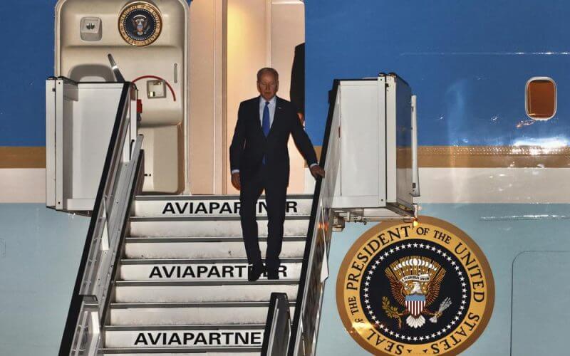 U.S. President Joe Biden steps off Air Force One as he arrives at Melsbroek military airport in Brussels, Wednesday, March 23, 2022. Western leaders are arriving in Brussels for Thursday's summits taking place at NATO and EU headquarters where they will seek to highlight their sense of unity in the face of the Russian invasion in Ukraine. (AP Photo/Olivier Matthys)