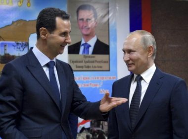 Syrian President Bashar Assad, left, gestures while speaking to Russian President Vladimir Putin during their meeting in Damascus, Syria, Tuesday, Jan. 7, 2020. With its war on Ukraine now in its third week, Putin on Friday, March 11, 2022, approved bringing in volunteer fighters from the Middle East into the conflict. (Alexei Druzhinin, Sputnik, Kremlin Pool Photo via AP, File)