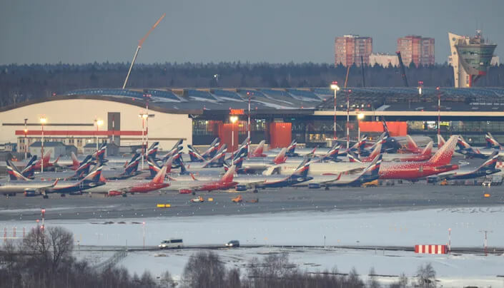 Passenger planes owned by Russia's airlines, including Aeroflot and Rossiya, are parked at Sheremetyevo International Airport in Moscow on March 1. (Marina Lystseva/Reuters)