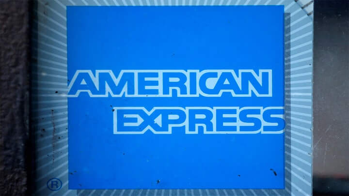FILE: The logo of Dow Jones Industrial Average stock market index listed company American Express (AXP) is seen in Los Angeles, California, United States, April 25, 2016. (Reuters/Lucy Nicholson/File Photo)