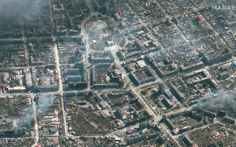 A satellite image shows an overview of Mariupol burning building and Mariupol Theater, Ukraine, March 21, 2022. Satellite image ©2022 Maxar Technologies/Handout via REUTERS ATTENTION EDITORS - THIS IMAGE HAS BEEN SUPPLIED BY A THIRD PARTY. MANDATORY CREDIT. NO RESALES. NO ARCHIVES. DO NOT OBSCURE LOGO.