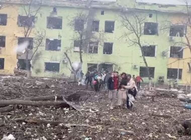 A person is carried out after the destruction of Mariupol children's hospital as Russia's invasion of Ukraine continues, in Mariupol, Ukraine, March 9, 2022 in this still image from a handout video obtained by Reuters. Ukraine Military/Handout via REUTERS