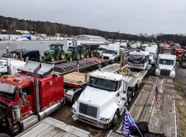 Hundreds of vehicles including 18-wheeler trucks, RVs and other cars are parked as part of a rally at Hagerstown Speedway after some of them arrived as part of a convoy that traveled across the country headed to Washington D.C. to protest coronavirus disease (COVID-19) related mandates and other issues in Hagerstown, Maryland, U.S., March 5, 2022. REUTERS/Stephanie Keith