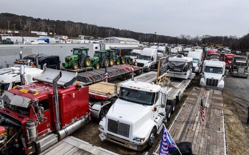 Hundreds of vehicles including 18-wheeler trucks, RVs and other cars are parked as part of a rally at Hagerstown Speedway after some of them arrived as part of a convoy that traveled across the country headed to Washington D.C. to protest coronavirus disease (COVID-19) related mandates and other issues in Hagerstown, Maryland, U.S., March 5, 2022. REUTERS/Stephanie Keith