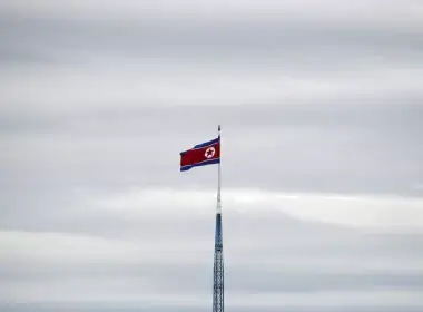 A North Korean flag flutters on top of a 160-metre tower in North Korea's propaganda village of Gijungdong, in this picture taken from the Tae Sung freedom village near the Military Demarcation Line (MDL), inside the demilitarised zone separating the two Koreas, in Paju, South Korea, April 24, 2018. REUTERS/Kim Hong-Ji/ File Photo