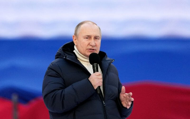 Russian President Vladimir Putin delivers a speech during a concert marking the eighth anniversary of Russia's annexation of Crimea at Luzhniki Stadium in Moscow, Russia March 18, 2022. RIA Novosti Host Photo Agency/Alexander Vilf via REUTERS/File Photo