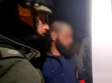 Israeli security forces arrest a suspect. Photo: Israel Police
