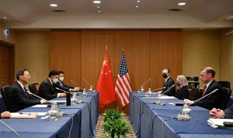 Chinese Central Foreign Affairs Commission Director Yang Jiechi (L) and White House national security adviser Jake Sullivan (R) meet alongside their respective delegations for talks in Rome, Italy, on Monday. CHINESE MINISTRY OF FOREIGN AFFAIRS