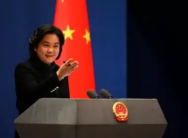 Chinese Foreign Ministry spokesperson Hua Chunying scoffed at the Biden administration for failing to curb America's high inflation while U.S. arms companies are thriving from Russia's war on Ukraine. Above, Hua gestures during the daily press conference at the Foreign Ministry in Beijing last month. NOEL CELIS/GETTY IMAGES