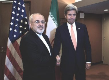 Former Iranian foreign minister Mohammad Javad Zarif and John Kerry (Don Emmert/AFP via Getty Images)