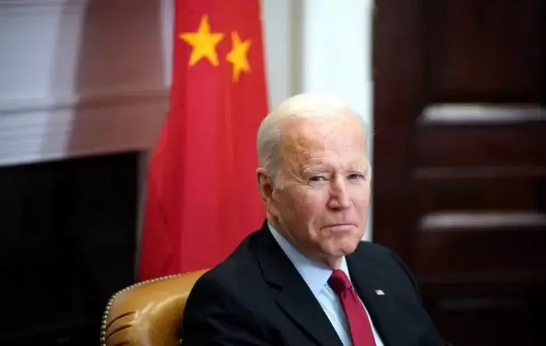 President Joe Biden meets with China's President Xi Jinping during a virtual summit from the Roosevelt Room of the White House in Washington, DC, on November 15, 2021. The pair held a nearly two-hour video call on March 18 on the Ukraine invasion. MANDEL NGAN/AFP/GETTY IMAGES