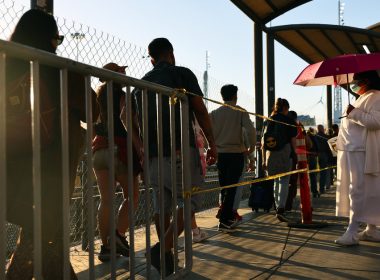 People cross the southern border into the United States on March 22, 2022 in Tijuana, Mexico. | Mario Tama/Getty Images