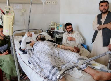 An Afghan man receives treatment in a hospital after he was injured in an explosion at a Shi'ite mosque in Mazar-e-Sharif, Afghanistan, April 21, 2022. REUTERS/Stringer