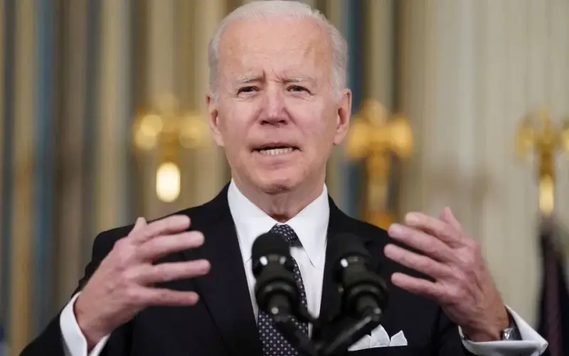 U.S. President Joe Biden responds to a question about Ukraine during an event to announce his budget proposal for fiscal year 2023, in the State Dining Room at the White House in Washington, U.S., March 28, 2022. REUTERS/Kevin Lamarque/File Photo
