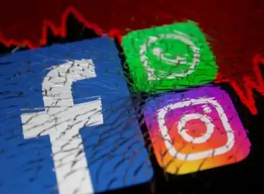 Facebook, Whatsapp and Instagram logos and stock graph are displayed through broken glass in this illustration taken October 4, 2021. (photo credit: REUTERS/DADO RUVIC)