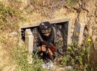 A member of the Palestinian Islamic Jihad terror group exits a tunnel in the Gaza Strip, on April 17, 2022, during a media tour amid escalating violence with Israel. (Mahmud Hams/AFP)