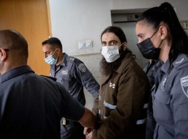 Wasim a-Sayed arrives for a court hearing on murder charges at the District Court in Jerusalem, April 18, 2022. (Yonatan Sindel/Flash90)