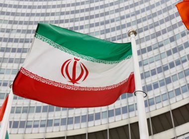 The Iranian flag waves in front of the International Atomic Energy Agency (IAEA) headquarters, amid the coronavirus disease (COVID-19) pandemic, in Vienna, Austria May 23, 2021. REUTERS/Leonhard Foeger