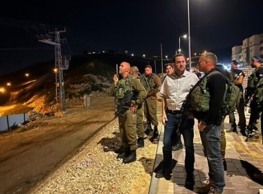Samaria Regional Council head Yossi Dagan, alongside military and local security forces in the settlement of Avnei Hefetz in the northern West Bank, April 5, 2022. (Samaria Regional Council )