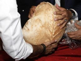 A Hellenic sculpture of a head from the ancient Libya city of Cyrene is displayed after it was returned by the United States Thursday, March 31, 2022 ,Tripoli, Libya. The United States returned a cache of smuggled ancient artifacts to Libya on Thursday as the oil-rich Mediterranean country struggles to protect its ancient heritage against the backdrop of years of war, turmoil and unrest. (AP Photo/Yousef Murad)