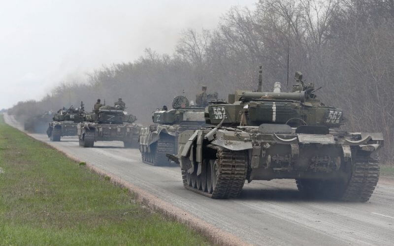 Tanks of pro-Russian troops drive along a road during Ukraine-Russia conflict near the southern port city of Mariupol, Ukraine April 17, 2022. REUTERS/Alexander Ermochenko
