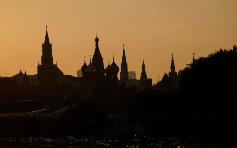 St. Basil's Cathedral and towers of Kremlin are silhouetted against the sunset in Moscow, Russia August 12, 2021. REUTERS/Evgenia Novozhenina