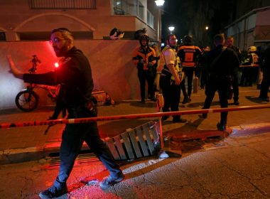 Israeli security and medical personnel secure the scene of an attack in Tel Aviv, Israel on March 29 / Reuters