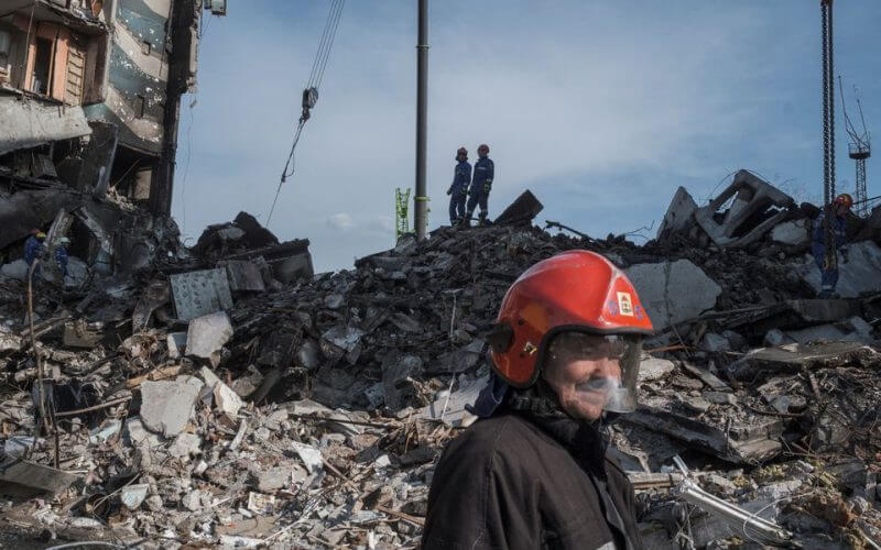 Firefighters work at the site of buildings that were destroyed by shelling, amid Russia's invasion of Ukraine in Borodyanka, in the Kyiv region, Ukraine, April 7, 2022. REUTERS/Marko Djurica