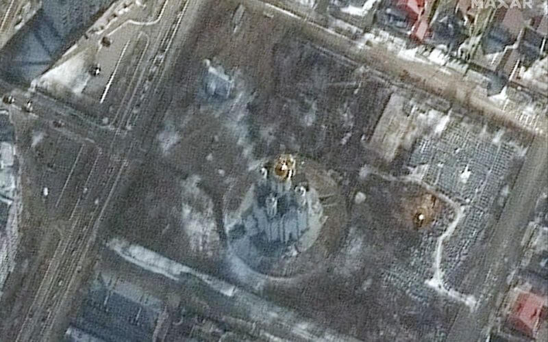 A satellite image shows first signs of excavation of a mass grave on the grounds of the Church of St. Andrew and Pyervozvannoho All Saints, in Bucha, Ukraine, March 10, 2022. Picture taken March 10, 2022. Satellite image 2022 Maxar Technologies/Handout via REUTERS