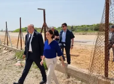 Israel's State Comptroller Matanyahu Engelman, left, with head of the Southern Sharon Regional Council, Oshrat Ganei Gonen, at the breach in the separation fence where the Bnei Brak terrorist entered Israel, March 31, 2022. Government Press Office