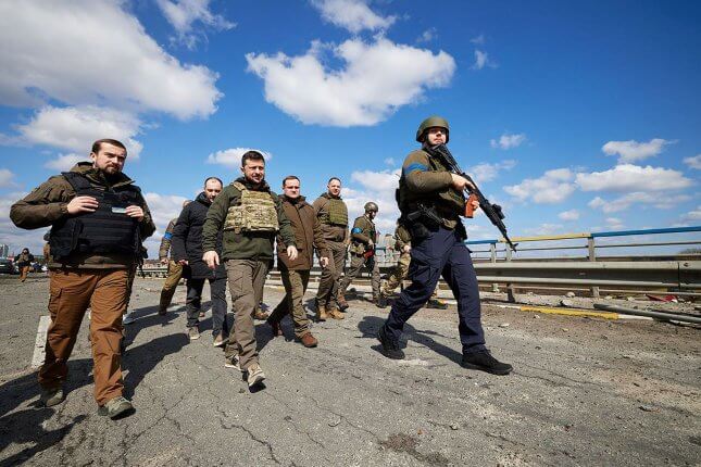 Ukrainian President Volodymyr Zelensky walks through streets in Bucha, Ukraine, near Kyiv, on Monday. Western governments began to ratchet up punishment this week against Moscow after images of dead civilians emerged from the Kyiv suburb. Photo courtesy of Ukrainian Presidential Office/UPI | License Photo