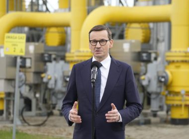 Poland's Prime Minister Mateusz Morawiecki speaks to media at the gas station of Gaz-System in Rembelszczyzna, near Warsaw, Poland, Wednesday, April 27, 2022. Polish and Bulgarian leaders accused Moscow of using natural gas to blackmail their countries after Russia's state-controlled energy company stopped supplying the two European nations Wednesday. (AP Photo/Czarek Sokolowski)