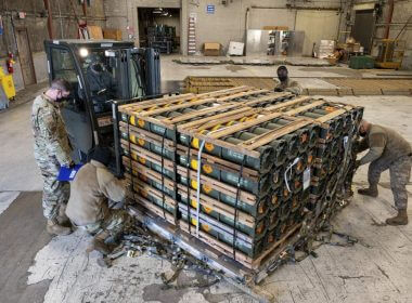 In this image provided by the U.S. Air Force, Airmen and civilians from the 436th Aerial Port Squadron palletize ammunition, weapons and other equipment bound for Ukraine during a foreign military sales mission at Dover Air Force Base, Del., on Jan. 21, 2022. Western weaponry pouring into Ukraine helped blunt Russia's initial offensive and seems certain to play a central role in the approaching battle for Ukraine's contested Donbas region. Yet the Russian military is making little headway halting what has become a historic arms express. (Mauricio Campino/U.S. Air Force via AP)