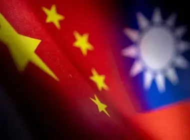Chinese and Taiwanese printed flags are seen in this illustration taken, April 28, 2022. Picture taken April 28, 2022. REUTERS/Dado Ruvic/Illustration