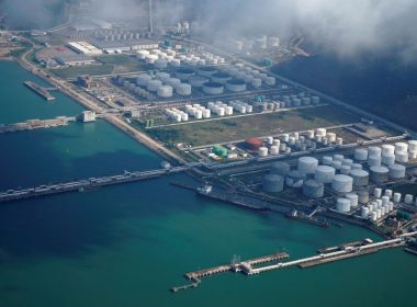 Oil and gas tanks are seen at an oil warehouse at a port in Zhuhai, China October 22, 2018. REUTERS/Aly Song