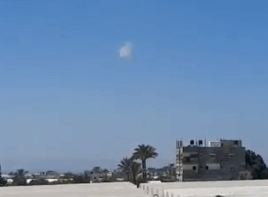 A cloud of smoke is seen over the Gaza Strip, after the Iron Dome intercepted a drone, May 19, 2022 (screenshot: Twitter)